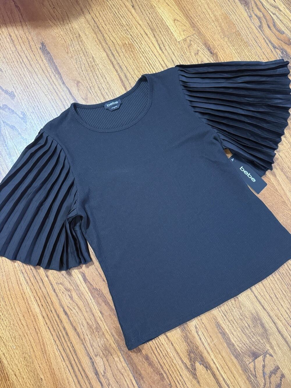 NWT Bebe Black Ribbed Top with Pleated Flutter Sleeves - Size XL C18